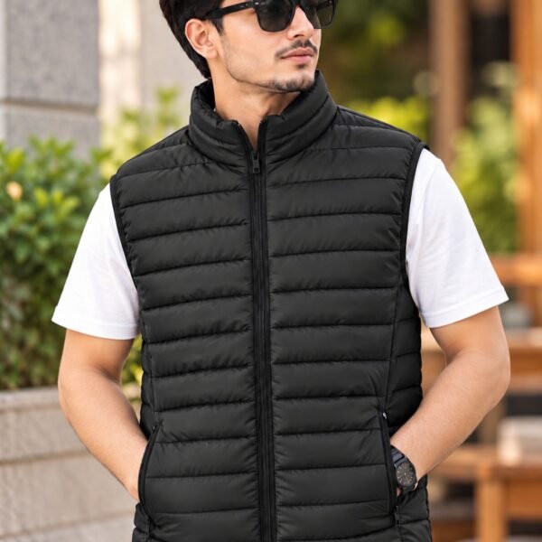 Black padded sleeveless vest jacket with horizontal quilted stitching and zip pockets